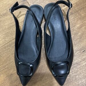 Black pointed toe sling back ballet flats.